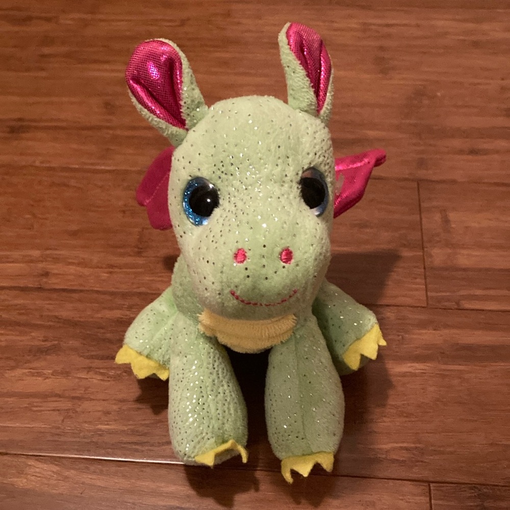 Green dragon with pink wings
